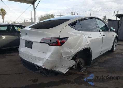 2022 Tesla Model Y Long Range Dual Motor All-Wheel Drive from USA, damaged, VIN 7SAYGDEE9NF561805
